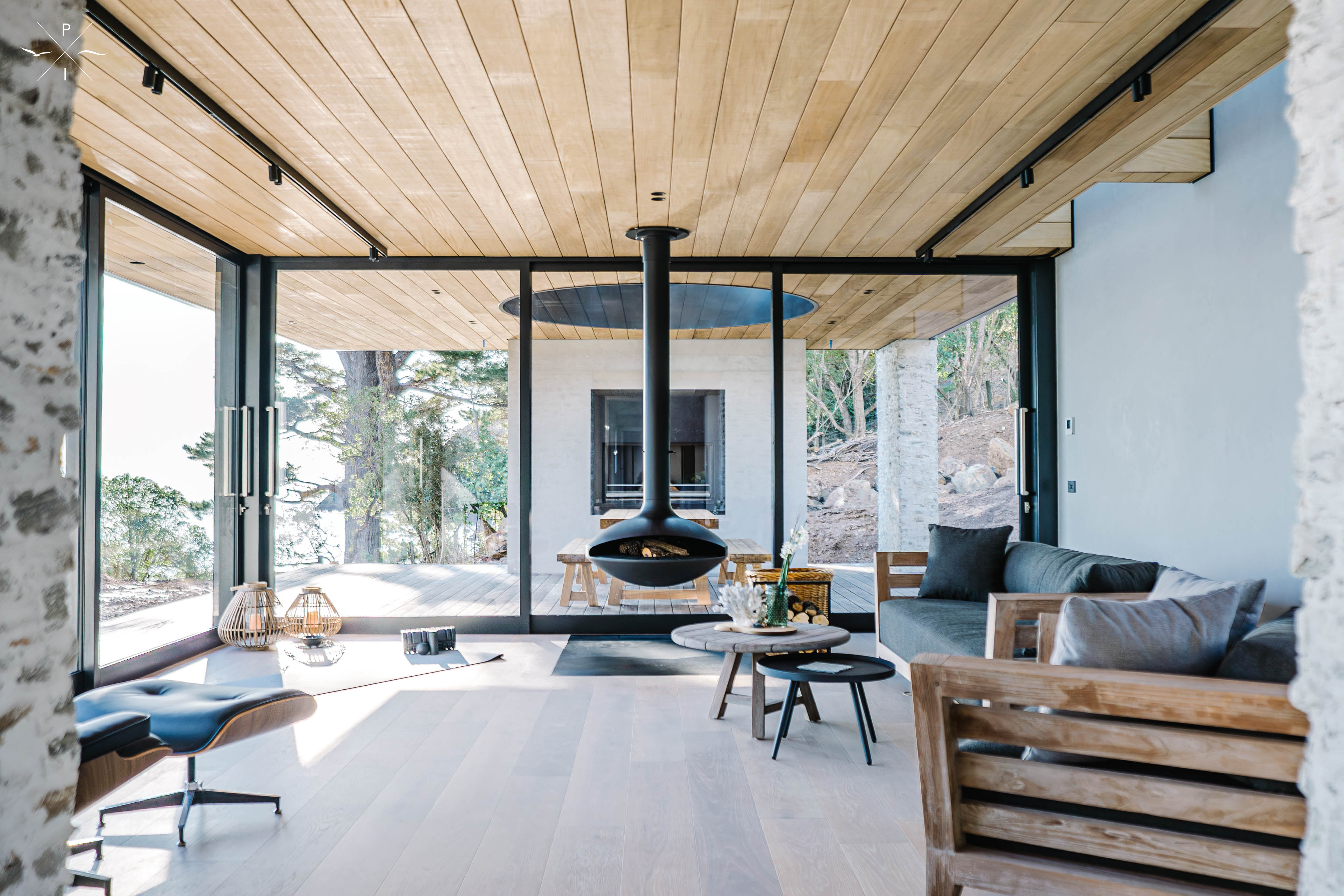 Pohutukawa living area with fireplace and view